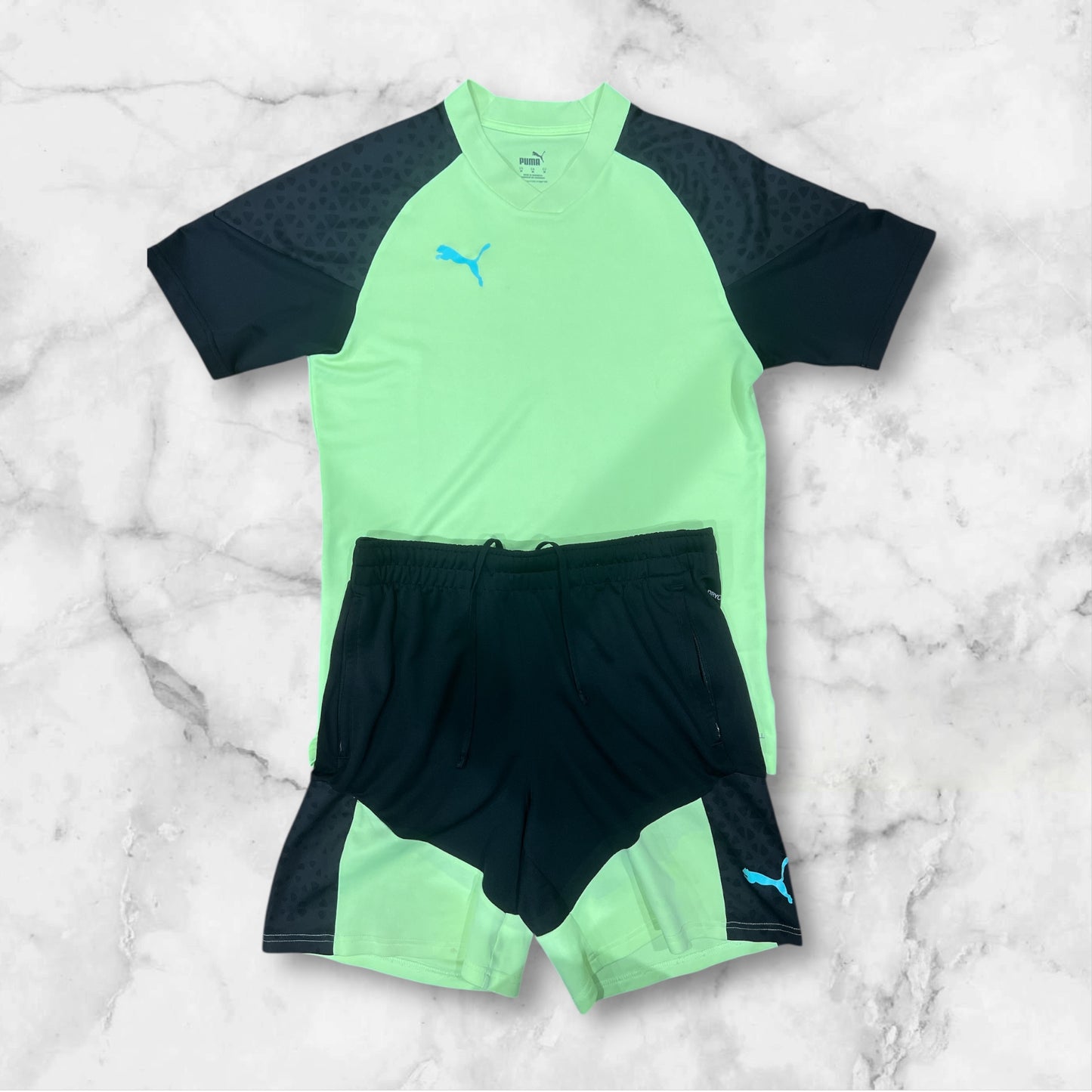 Conjunto deportivo Puma manga corta shorts